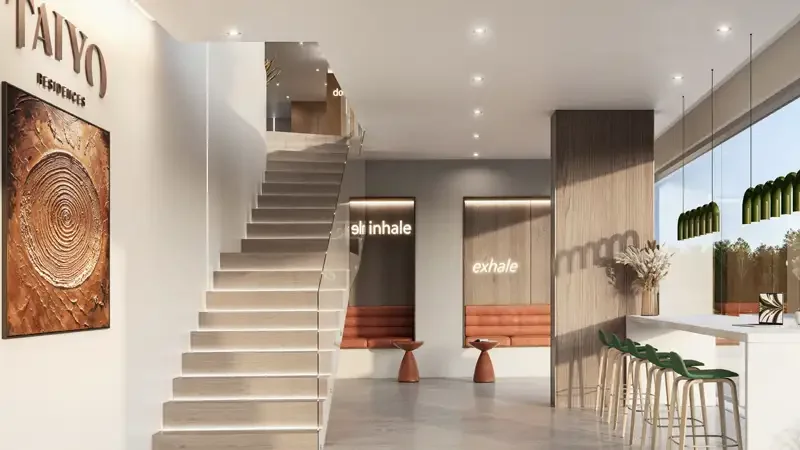 Meridian Residences wellness lounge with inhale and exhale signage